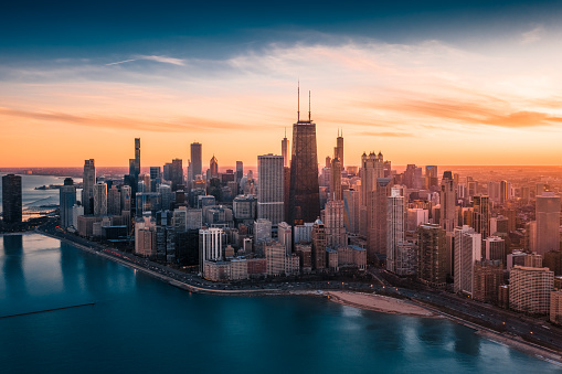 Aerial Dramatic View of Downtown Chicago at Sunset - Lake Shore Drive